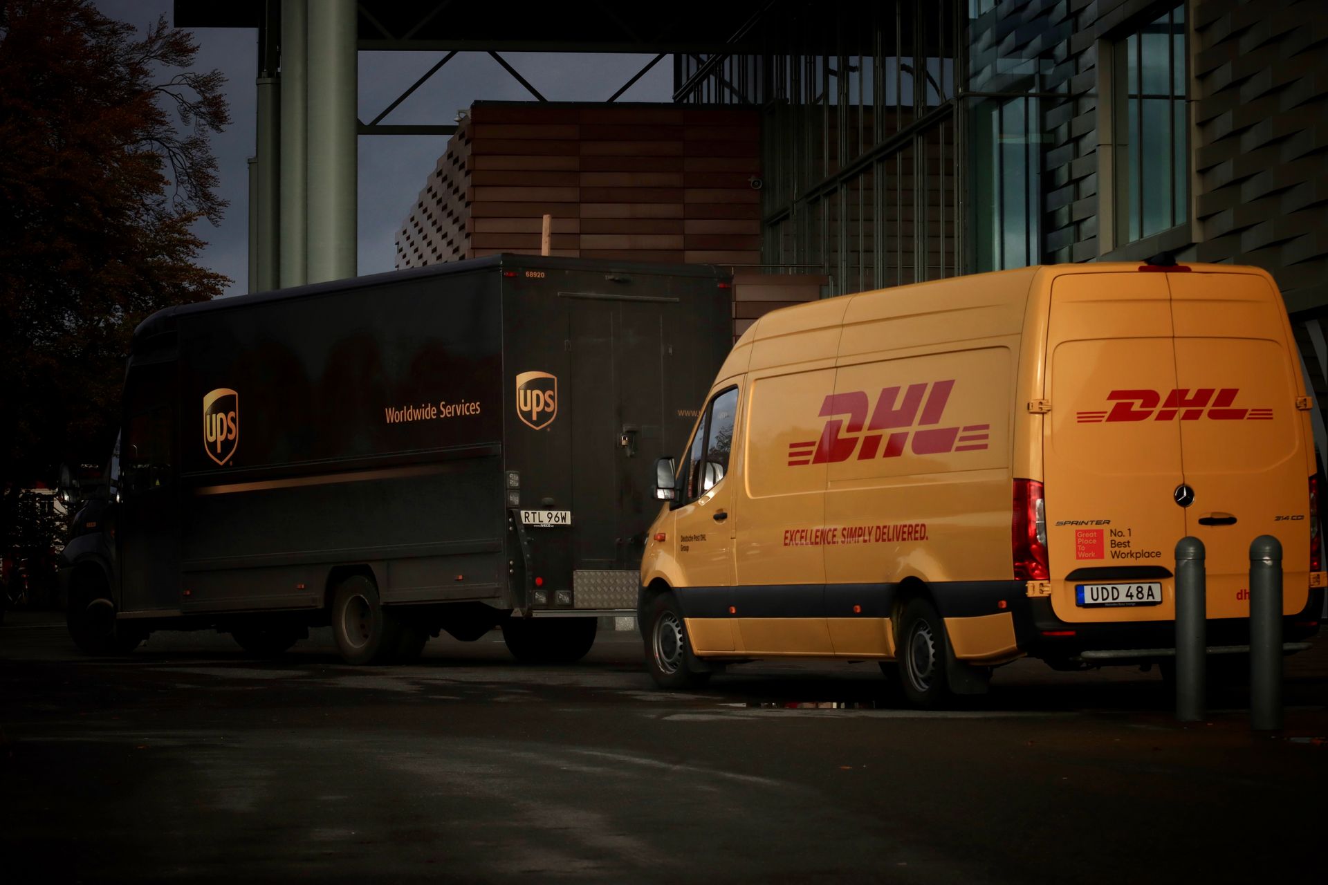 DHL and UPS courier vans